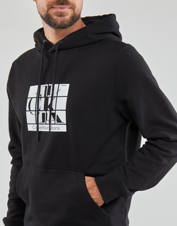 Calvin Klein Jeans SCATTERED URBAN GRAPHIC HOODIE Crna