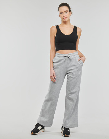 Odjeća Žene
 Donji dio trenirke New Balance Essentials Stacked Logo Sweat Pant Siva