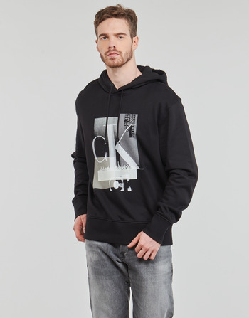 Odjeća Muškarci
 Sportske majice Calvin Klein Jeans CONNECTED LAYER LANDSCAPE HOODIE Crna