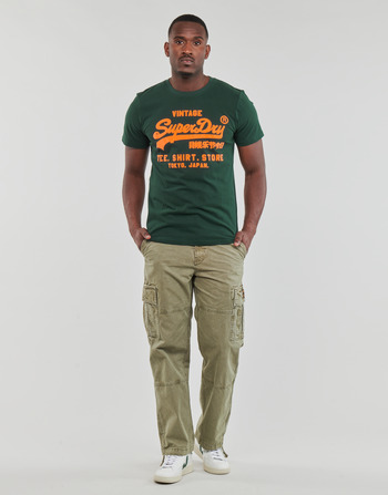 Odjeća Muškarci
 Cargo hlače Superdry BAGGY CARGO PANTS Zelena