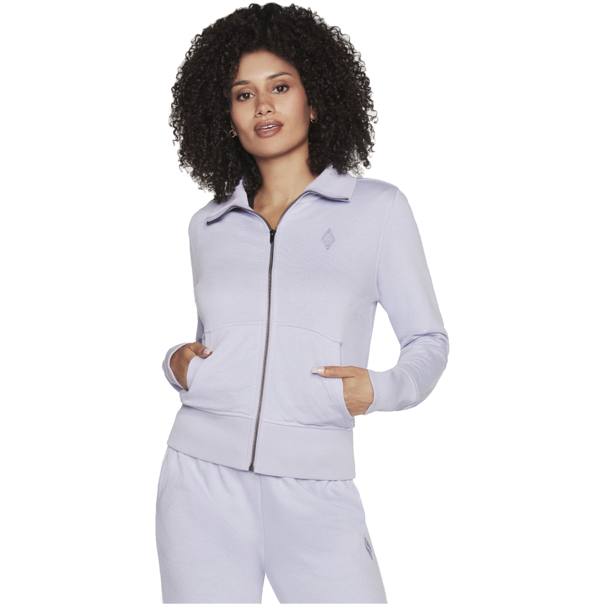 Odjeća Žene
 Gornji dijelovi trenirke Skechers The Hoodless Hoodie Diamond Jacket Ljubičasta
